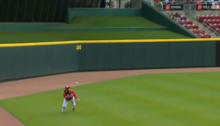 Jake Fraley makes a diving catch in the alley