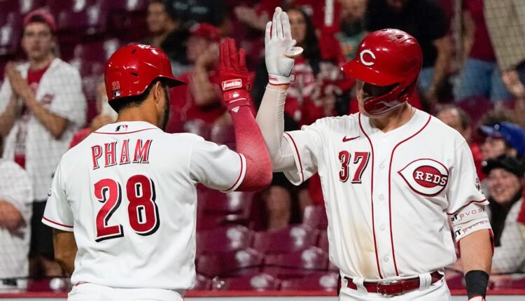 Reds pound five homers against D-backs